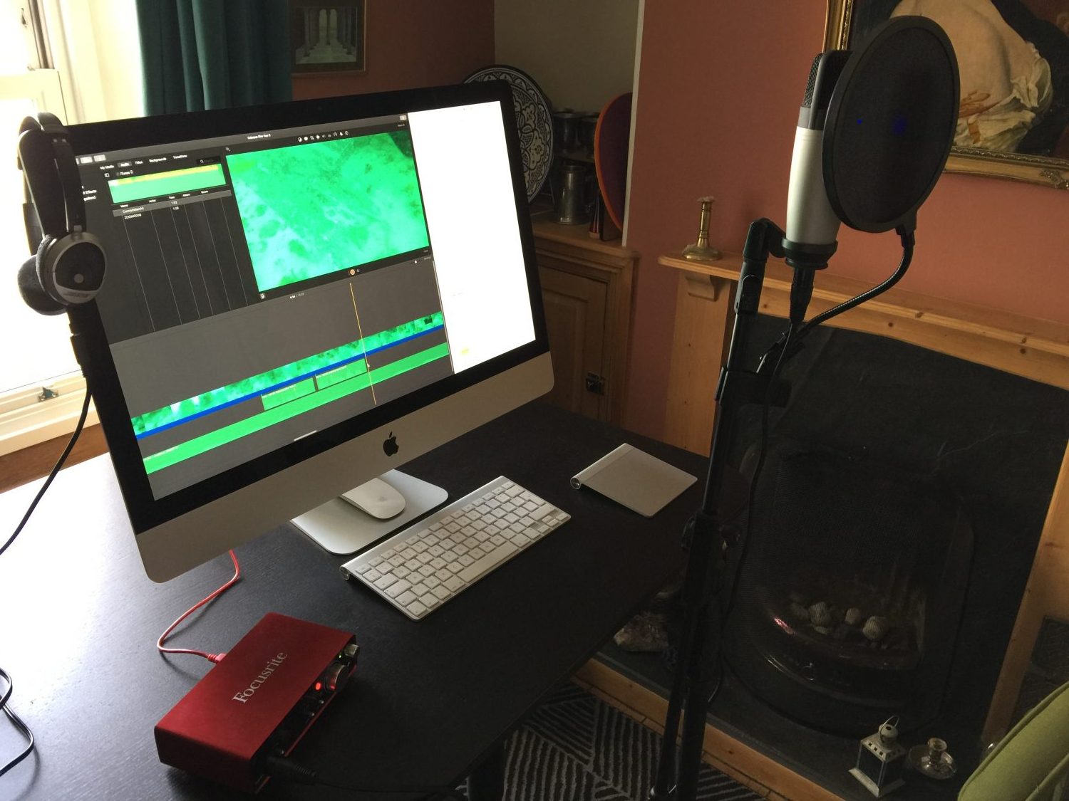 Computer with microphone and headphones